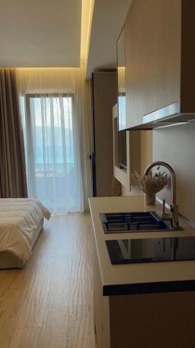 Gulta vai gultas numurā naktsmītnē Seamare Studio & Apartaments