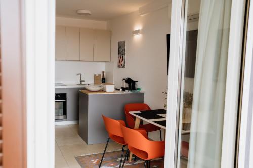 Η κουζίνα ή μικρή κουζίνα στο Apartmaji Punta