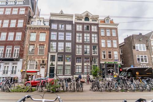 a group of bikes parked in front of a building at Suite Palette in Amsterdam