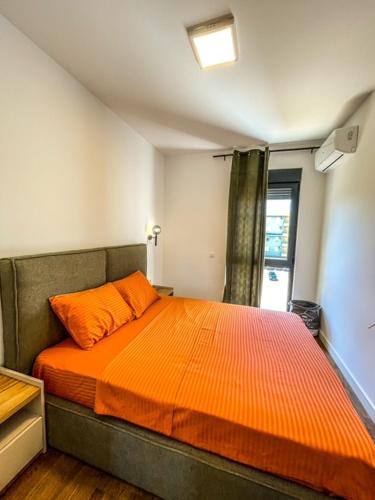 Postel nebo postele na pokoji v ubytování Soho Apartments