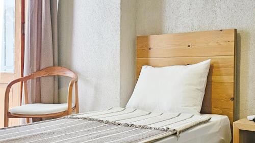 Nephos Beach Hotelにあるベッド