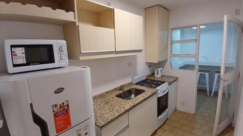 Kuchyň nebo kuchyňský kout v ubytování Ituzaingo Sanlo