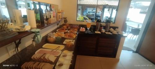 an overhead view of a counter with food on it at Pousada Estrela de Davi in Penha