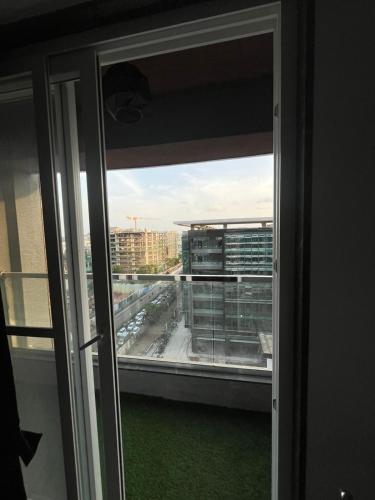 a view of a city from a window at Luxurious 3bhk Apartments in Pune