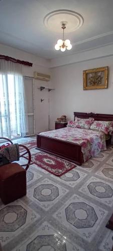 Postel nebo postele na pokoji v ubytování النعيمه هاوس