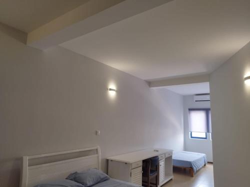 Postel nebo postele na pokoji v ubytování Residencial Alto do Fortim
