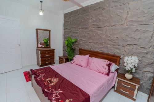 Ένα ή περισσότερα κρεβάτια σε δωμάτιο στο Madares sweet home appartment