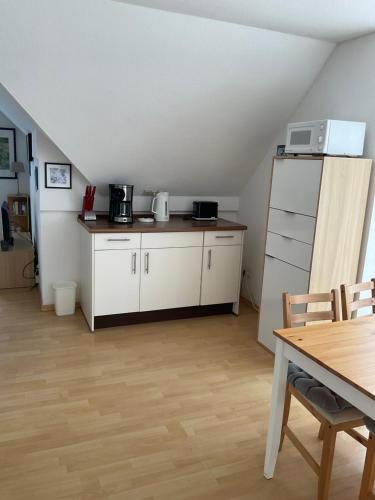 Een keuken of kitchenette bij Morgenröte an der See