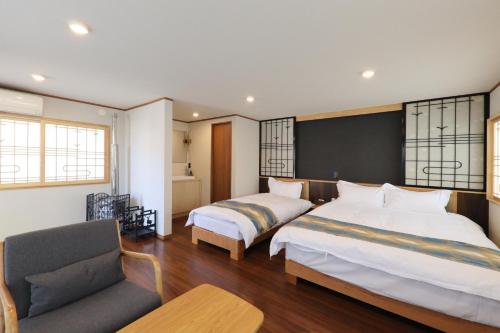 Una cama o camas en una habitación de Kurobe Sunvalley Hotel