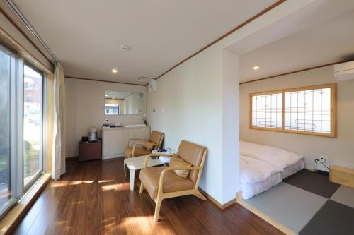 Una cama o camas en una habitación de Kurobe Sunvalley Hotel