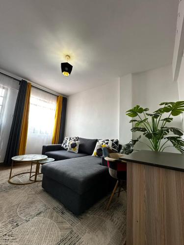Coin salon dans l'établissement Nano Cozy Homes -1 Bedroom with lift - TRM Drive