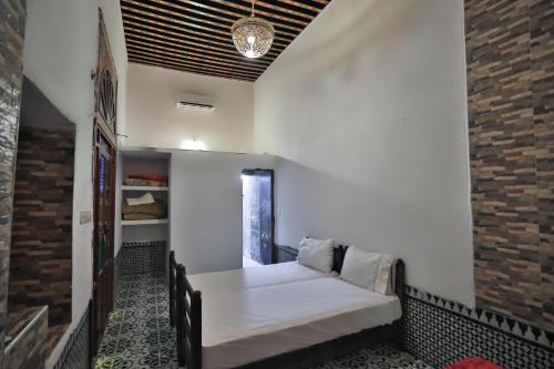 Cama o camas de una habitación en Riad Fes Zyna