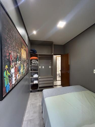 Postel nebo postele na pokoji v ubytování Penhasco Residences