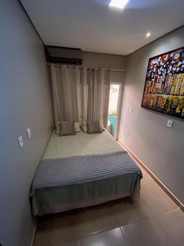 Postel nebo postele na pokoji v ubytování Penhasco Residences
