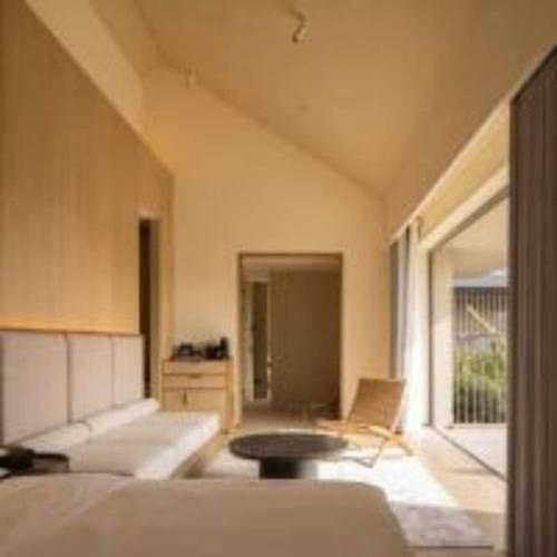 Cama o camas de una habitación en 扬州广陵有熊酒店