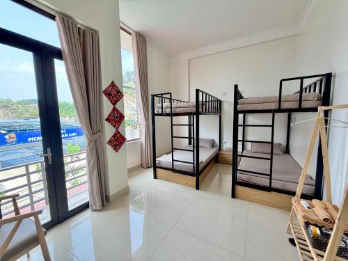 Ένα ή περισσότερα κρεβάτια σε δωμάτιο στο Haly Homestay