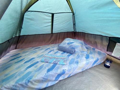 Casa Nordica - Rooms, Camping, Hammocksにあるベッド