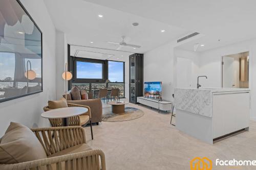a large living room with a kitchen and a living room at QW Luxury River City Views in Brisbane