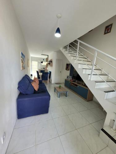 Ruang duduk di Casa duplex em Maracanaú com ar-condicionado