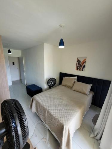 Katil atau katil-katil dalam bilik di Casa duplex em Maracanaú com ar-condicionado
