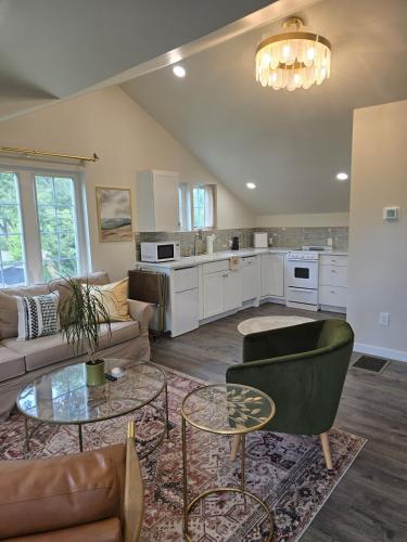 a living room with a couch and a table at Luxury Living in the city in Denver
