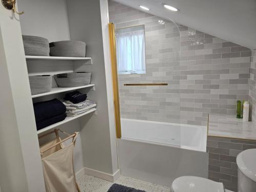 a bathroom with a shower and a sink at Luxury Living in the city in Denver