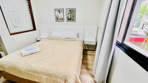 Postel nebo postele na pokoji v ubytování Flat Aconchegante - Drummond