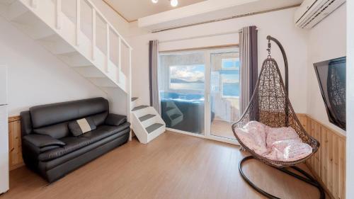 Posezení v ubytování Ganghwado Pension Haemiru Spa Pension