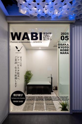 a store window with a wba sign on it at JAPAVISTA Wabi in Osaka