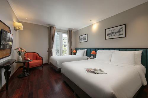 Sunline Central Hotelにあるベッド