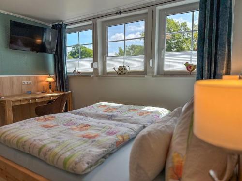 Katil atau katil-katil dalam bilik di Sonnenhof Damnatz -Hotel garni-