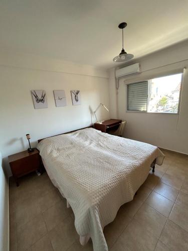 Ένα ή περισσότερα κρεβάτια σε δωμάτιο στο Apartamento barrio Candioti Sur