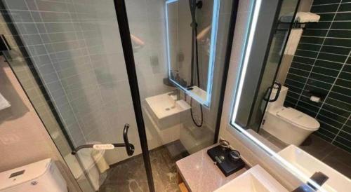 Ein Badezimmer in der Unterkunft GreenTree Inn Luoyang Railway Station Wangfujing Wangcheng Park