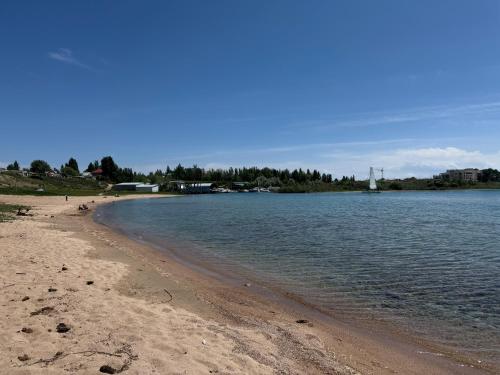 a view of a beach with the water at Иззат in Akchiy