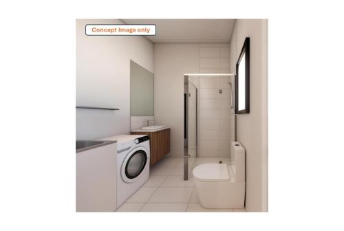 a bathroom with a washing machine and a toilet at Discovery Parks - Katherine in Katherine