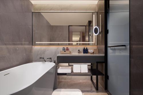 Ένα μπάνιο στο Radisson Blu Hotel, Shanghai Stadium