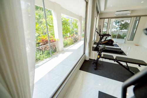 an office with a room with windows and a desk at THE NAVY HOUSE HOTEL in Sattahip