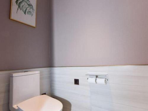 Ένα μπάνιο στο Echarm Plus Hotel Wuhan Wenhua Boulevard Dahualing Subway Statiom