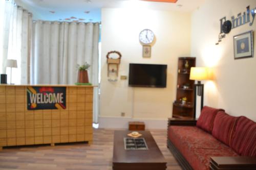 TV a/nebo společenská místnost v ubytování West End Lodges