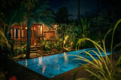 Πισίνα στο ή κοντά στο Kubu Kayu Villas