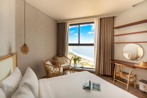 Cama o camas de una habitación en Nguyên Vũ Apec Mũi Né Mandala