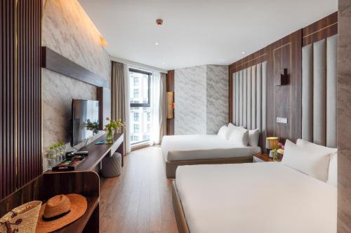 Cama o camas de una habitación en Nguyên Vũ Apec Mũi Né Mandala