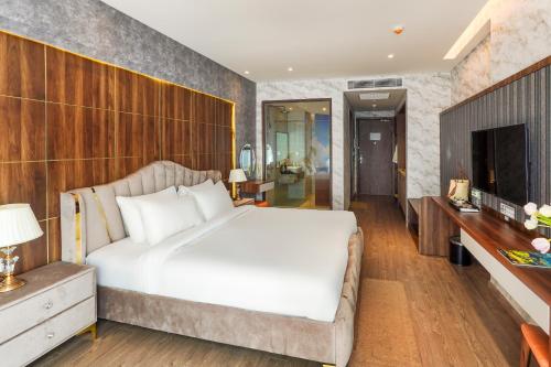Cama o camas de una habitación en Nguyên Vũ Apec Mũi Né Mandala