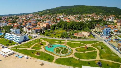 an aerial view of a city with a park at Къща Холидей Обзор in Obzor
