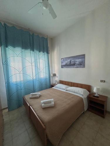 Postel nebo postele na pokoji v ubytování LUDO Holiday House