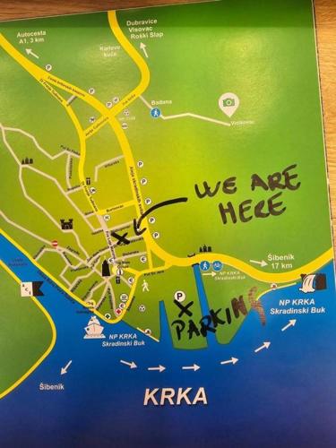 a map with the words we are here at Guest Accomodation Žura in Skradin