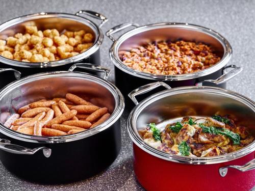 a group of four pots filled with different types of food at Royal Pines Hotel Chiba- Opening in Jan 2025 in Chiba