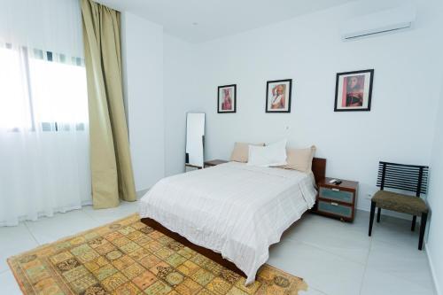 Giường trong phòng chung tại Lumineux T3 à la 8e tranche