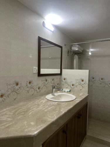 Ванная комната в Royal Regent Suites Dhaka