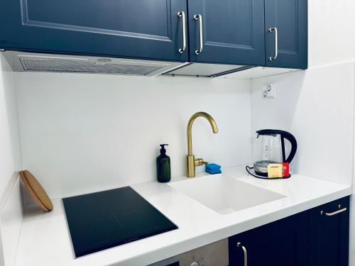 Kuchyň nebo kuchyňský kout v ubytování Katariina Apartments